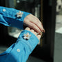 Astral Flora Pearl button cover on sleeve