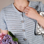 Bellis silver daisy clip-on button cover on knit