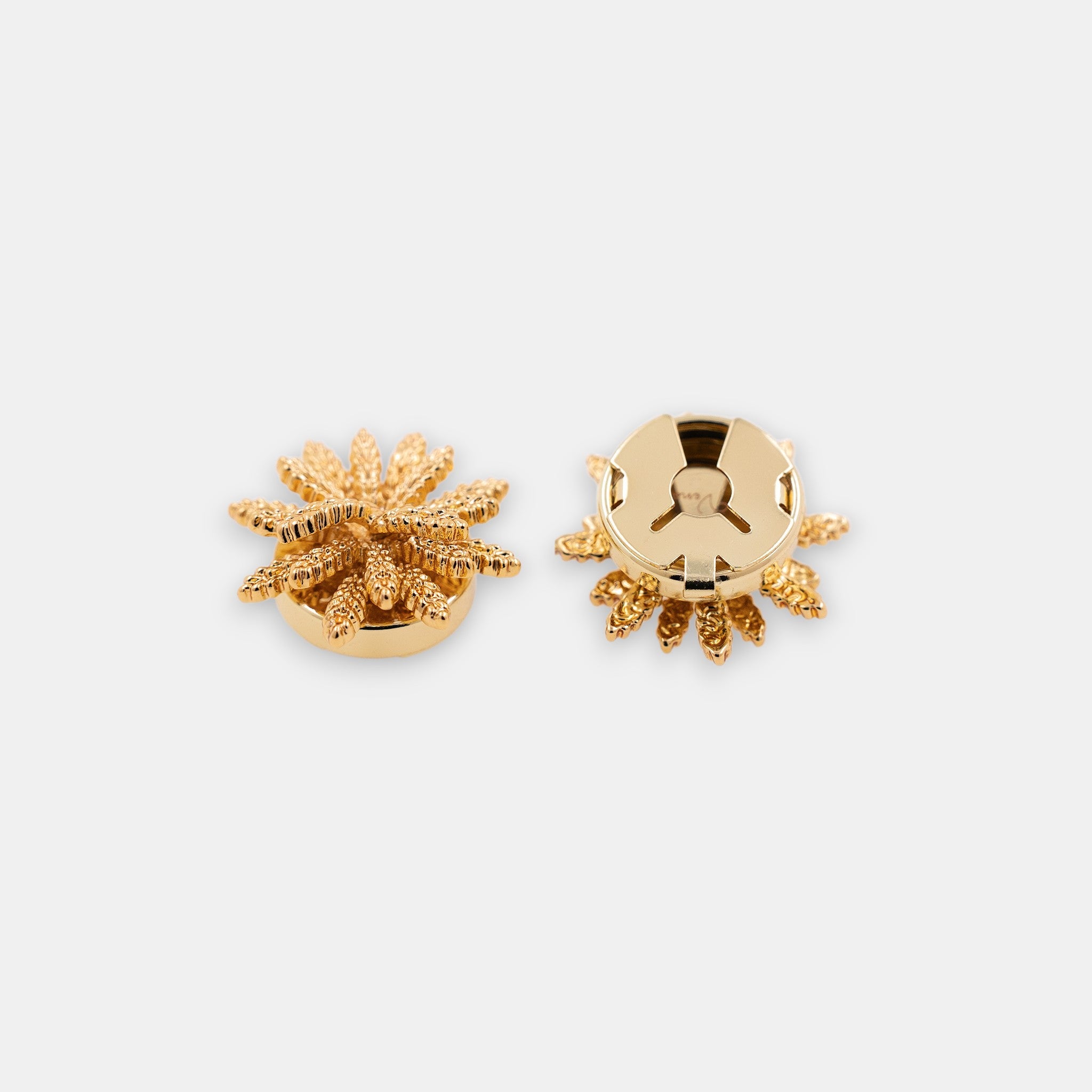 Midnight Spark 22K gold-plated sunburst clip-on button cover side