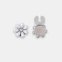 The Maya silver seven-petal teardrop pearl clip-on button cover with a rhinestone center