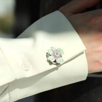 The Iris Silver button cover on sleeve