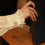 pearl constellation button cover on sleeve