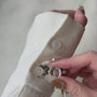 glacier blossom clip on button covers on hand